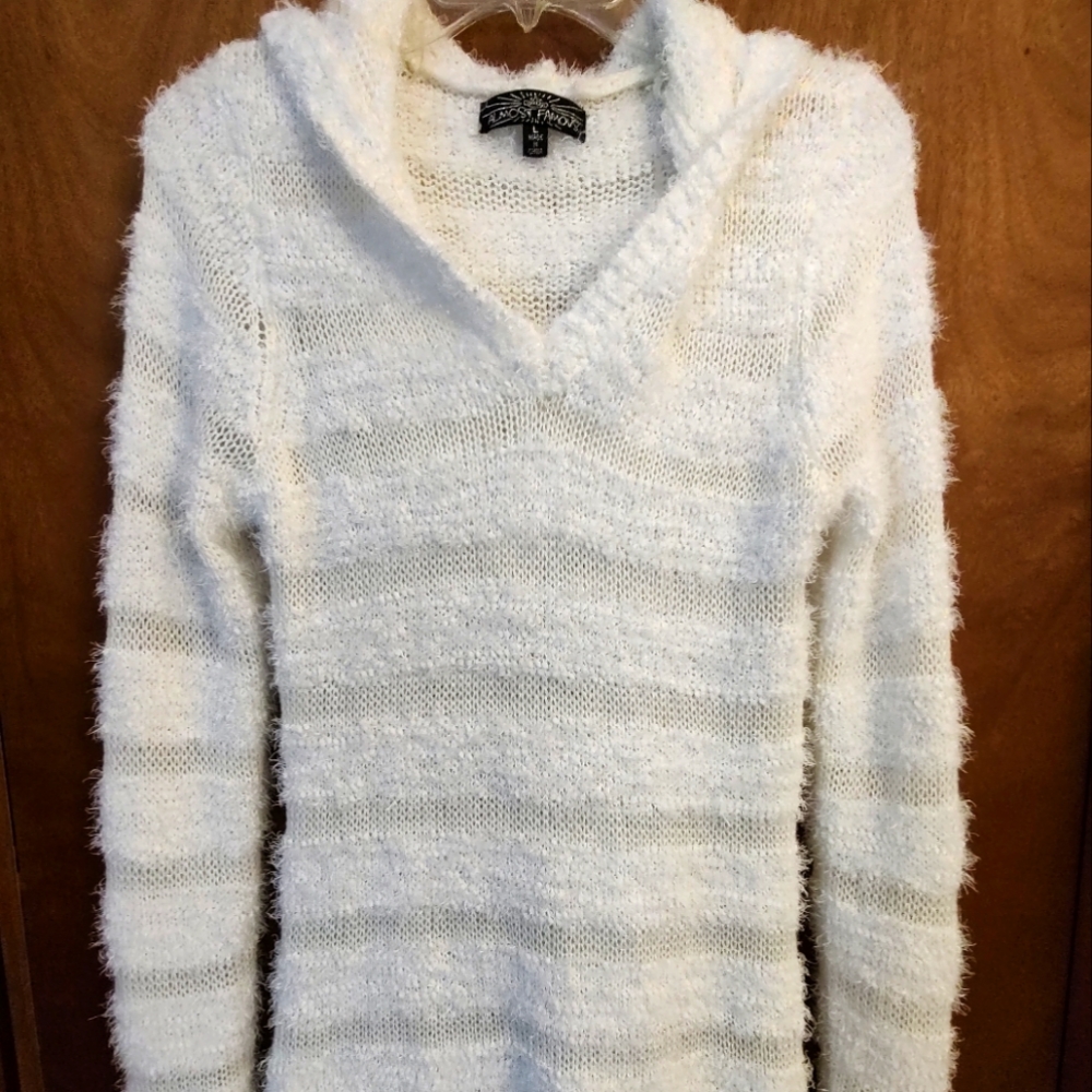 Almost Famous fluffy, shaggy white hooded tunic sweater. Size large.